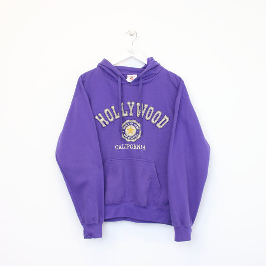 Vintage Unbranded Hollywood hoodie in purple. Best fits L