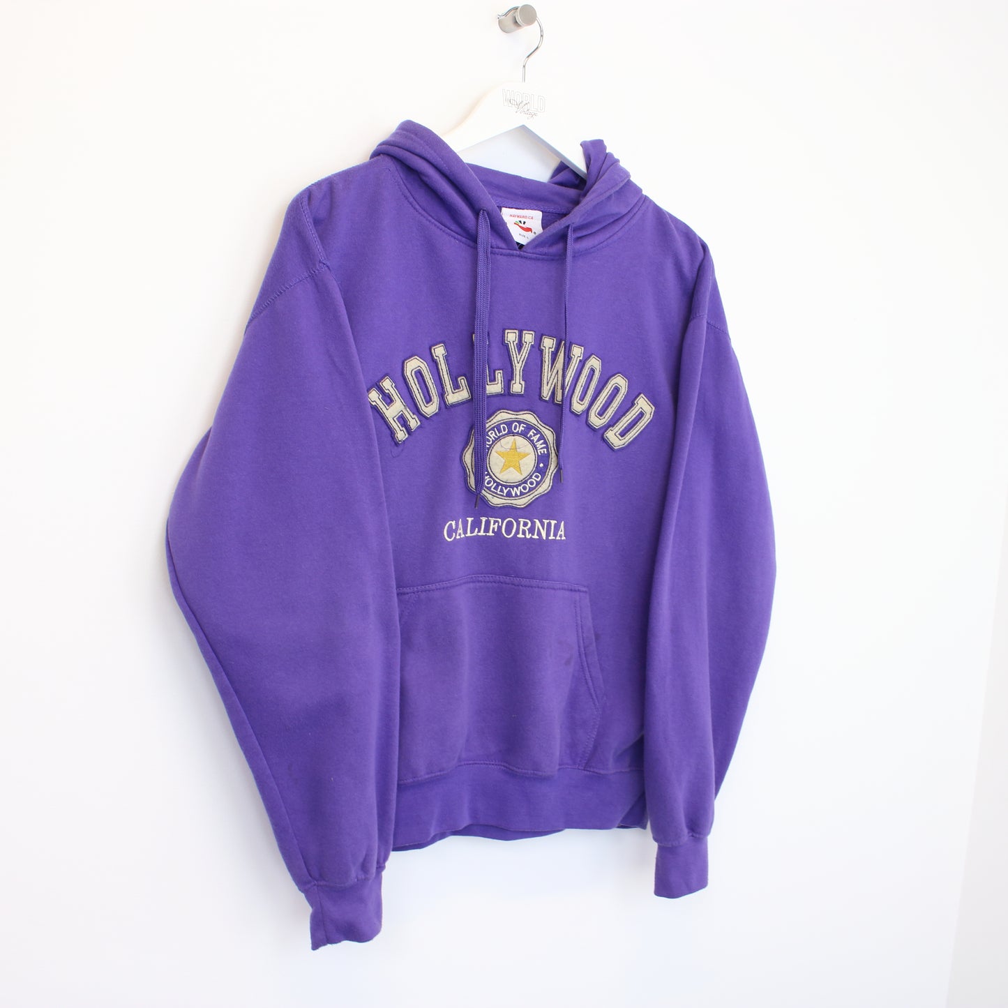 Vintage Unbranded Hollywood hoodie in purple. Best fits L