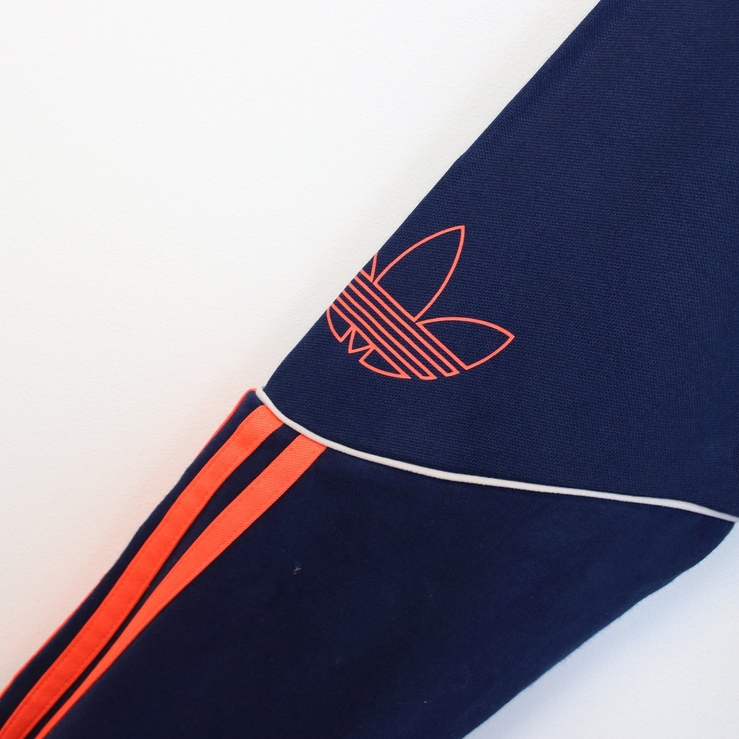Vintage Adidas hoodie in navy and orange. Best fits S