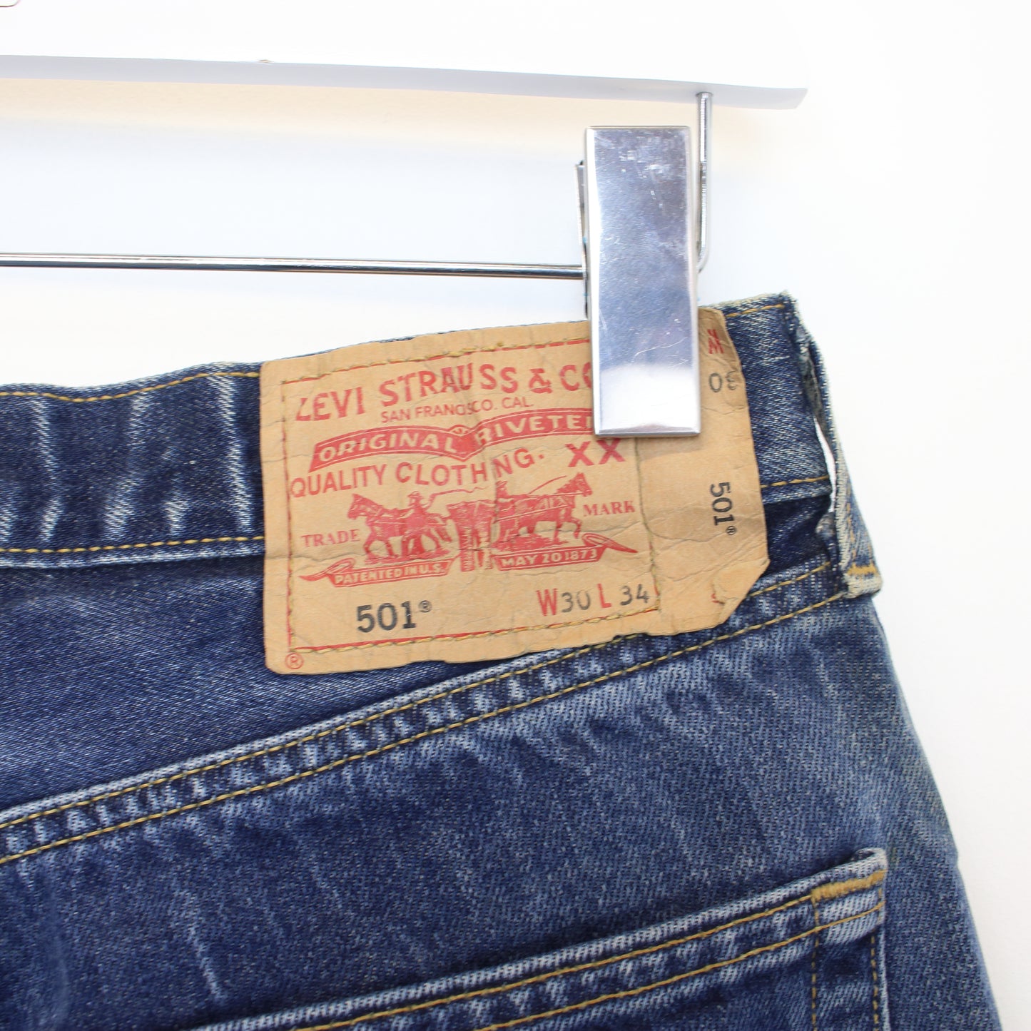 Vintage Levi's 501 cut off shorts in blue. Best fits 30