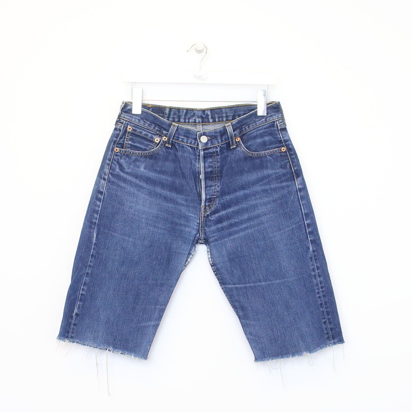 Vintage Levi's 501 cut off shorts in blue. Best fits 30