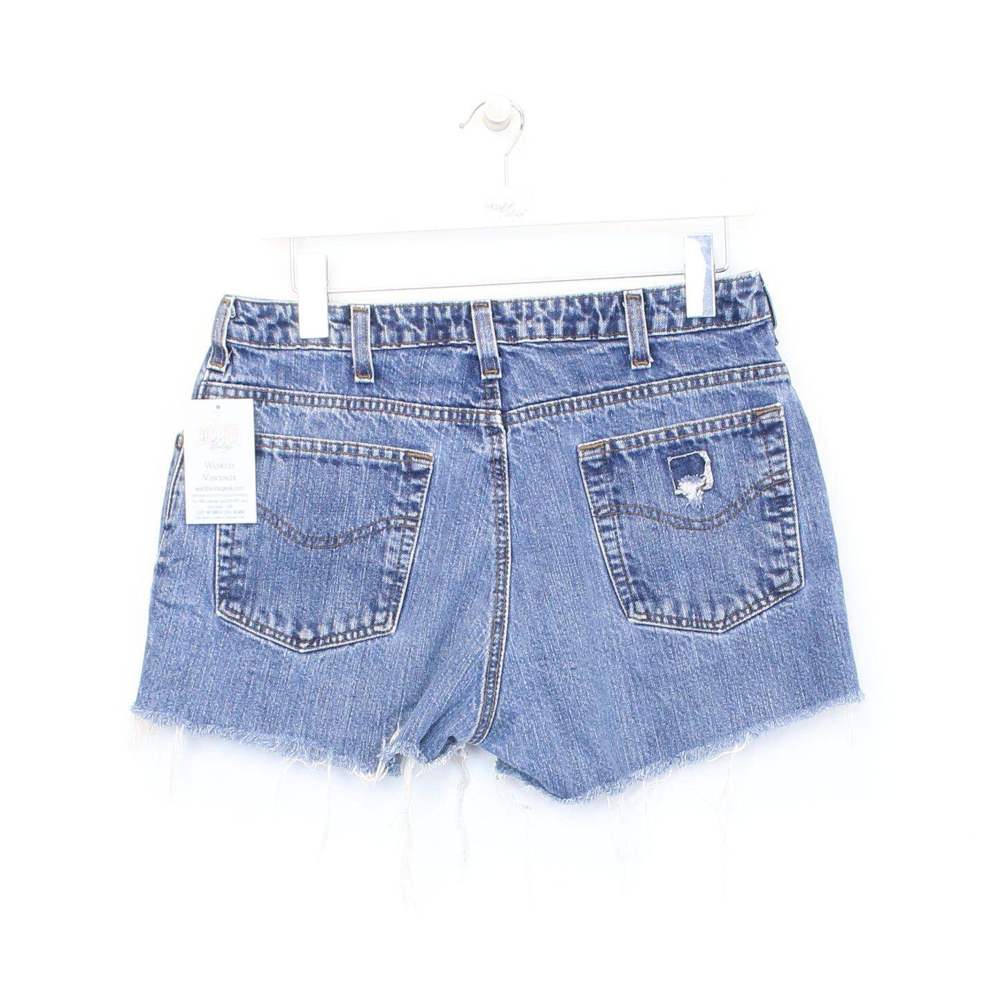 Vintage Women's Carhartt cut off shorts in blue. Best fits 32