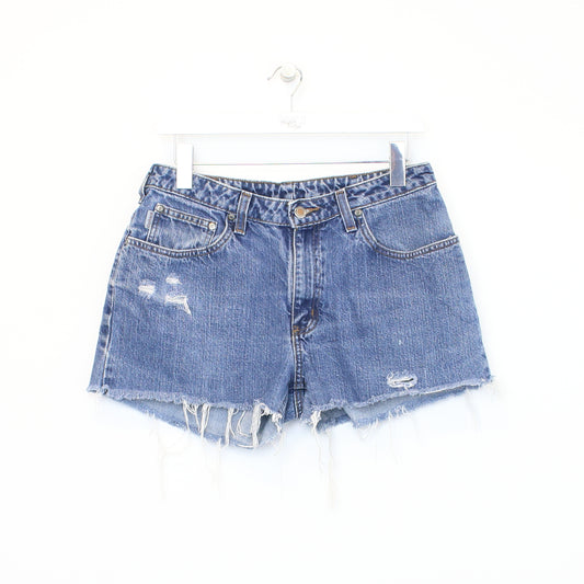 Vintage Women's Carhartt cut off shorts in blue. Best fits 32