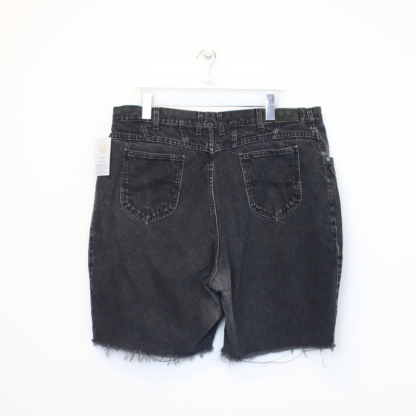 Vintage Lee cut off denim shorts in black. Best fits 40