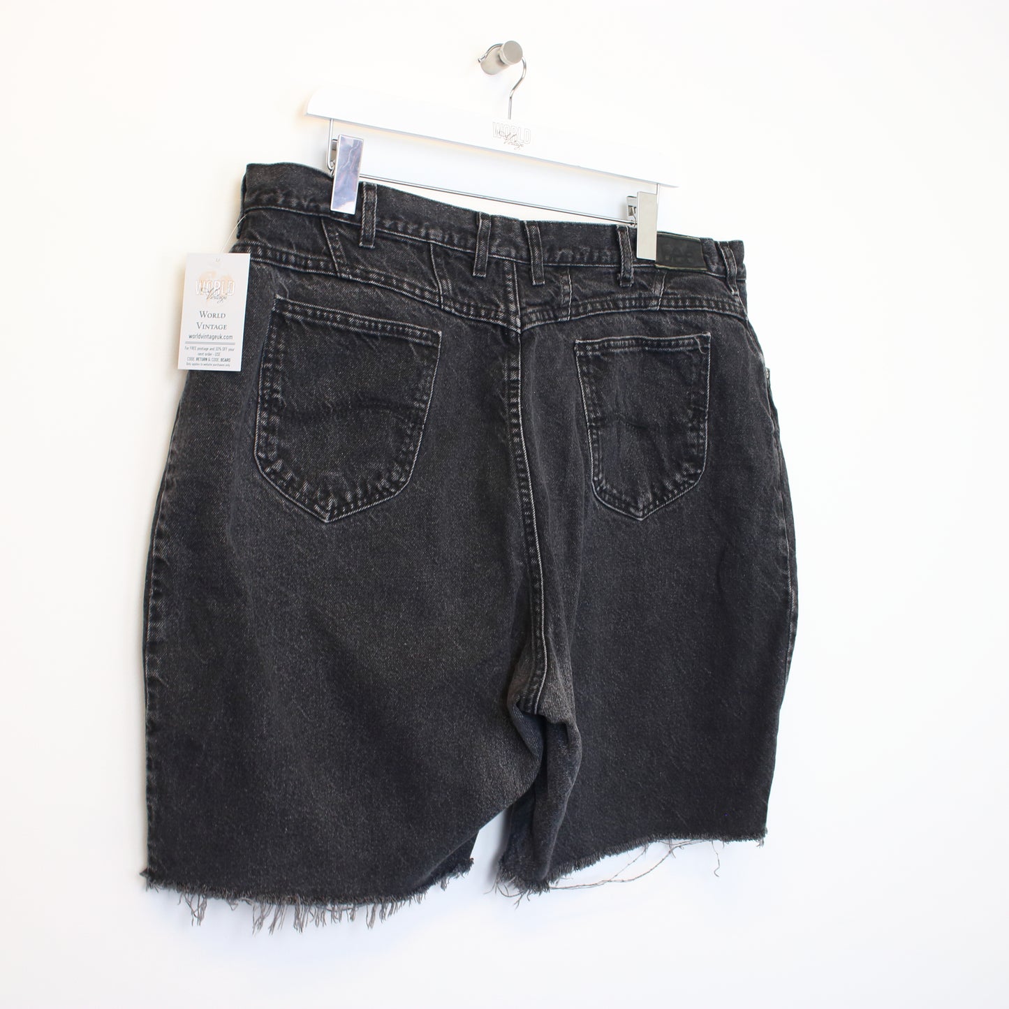 Vintage Lee cut off denim shorts in black. Best fits 40