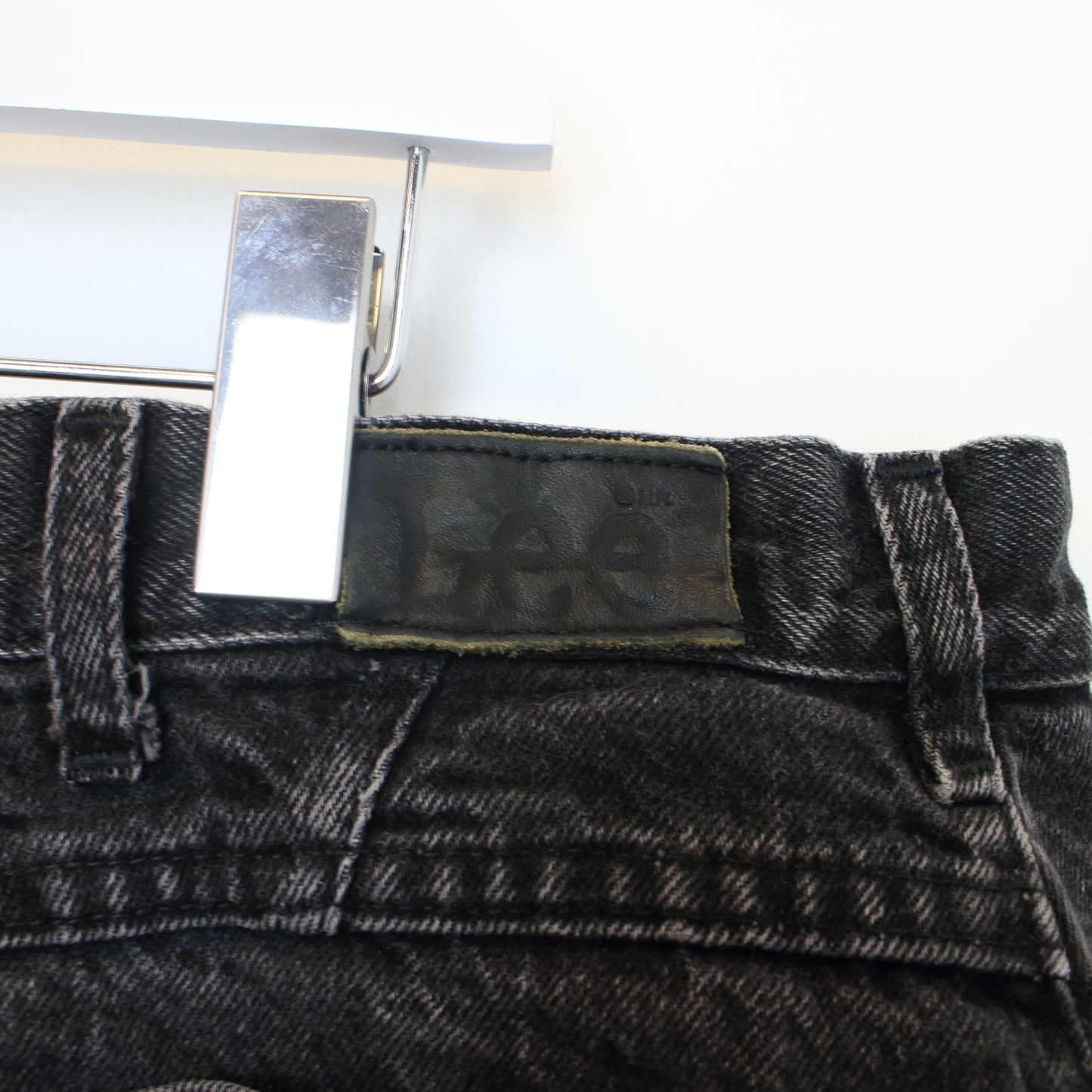 Vintage Lee cut off denim shorts in black. Best fits 40