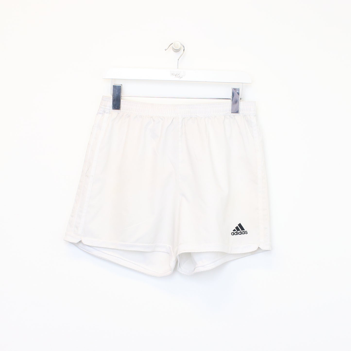 Vintage Adidas shorts in white. Best fits M