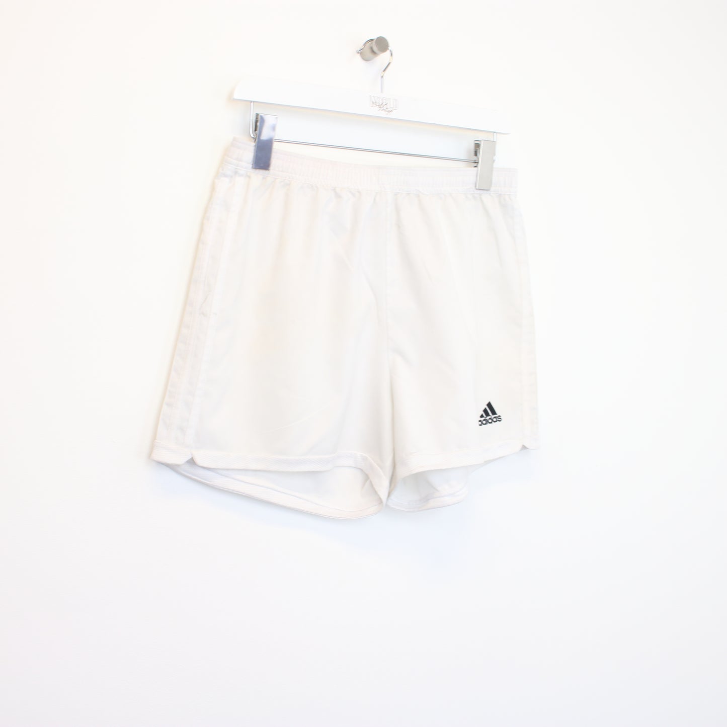 Vintage Adidas shorts in white. Best fits M