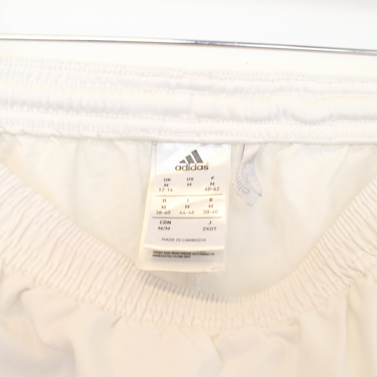 Vintage Adidas shorts in white. Best fits M