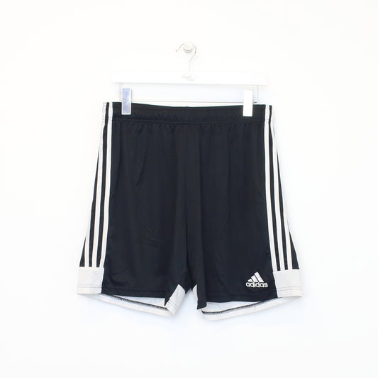 Vintage Adidas shorts in black and white. Best fits L