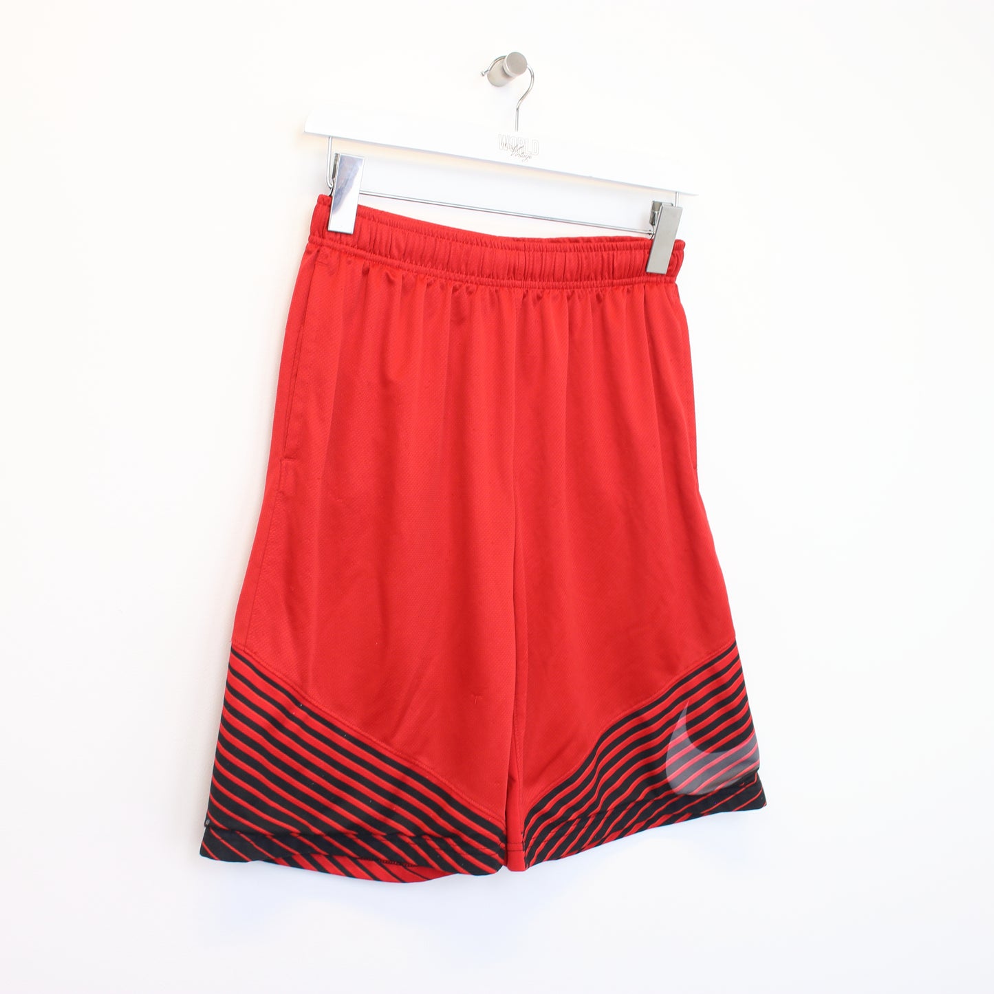 Vintage Nike shorts in red and black. Best fits M