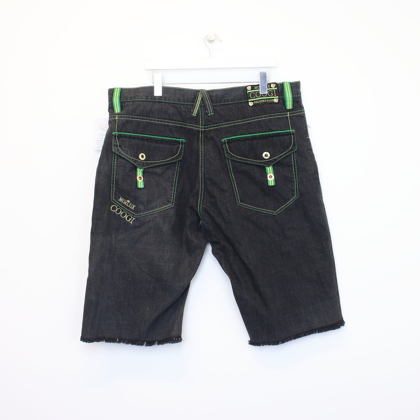 Vintage Coogi shorts in black and green. Best fits 42