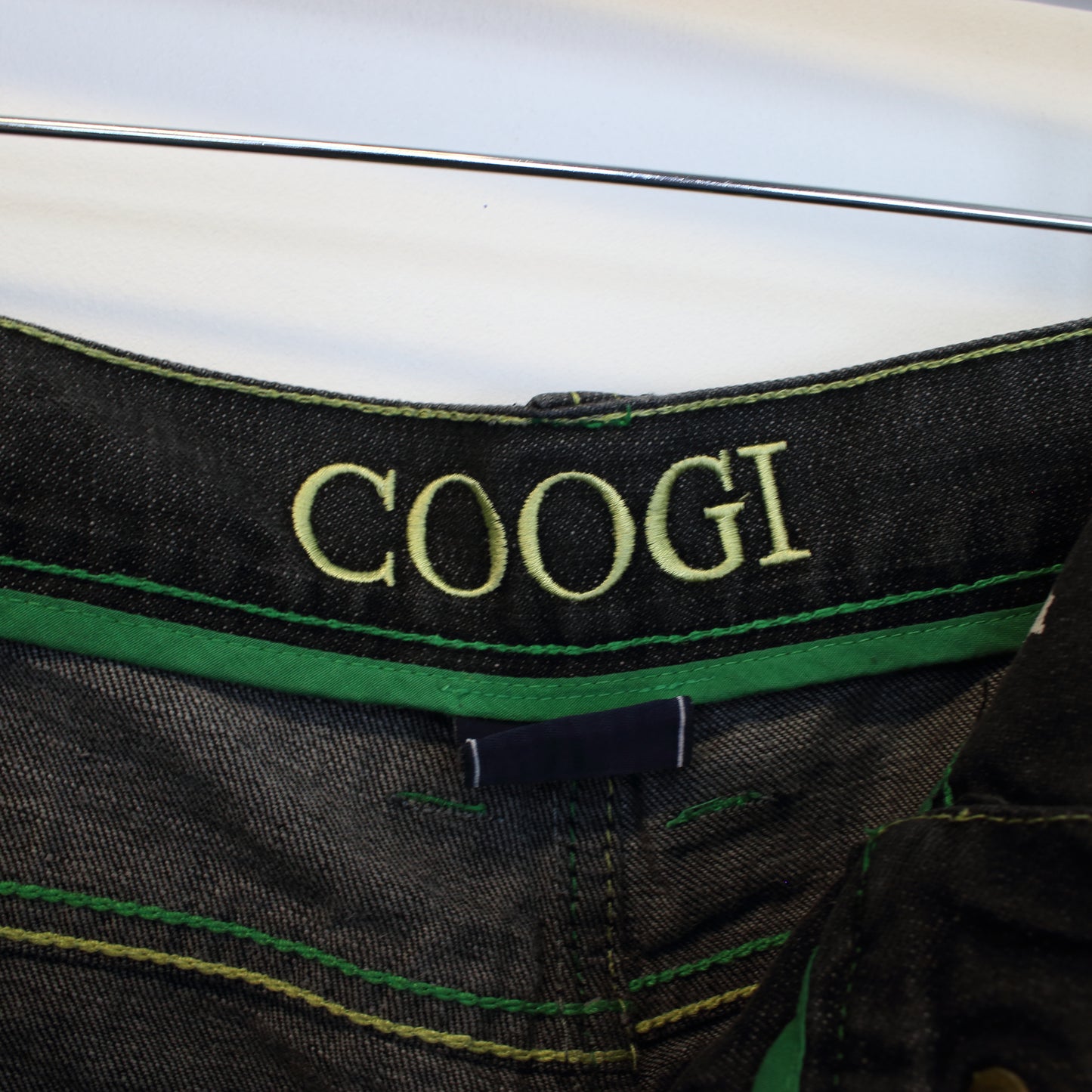 Vintage Coogi shorts in black and green. Best fits 42