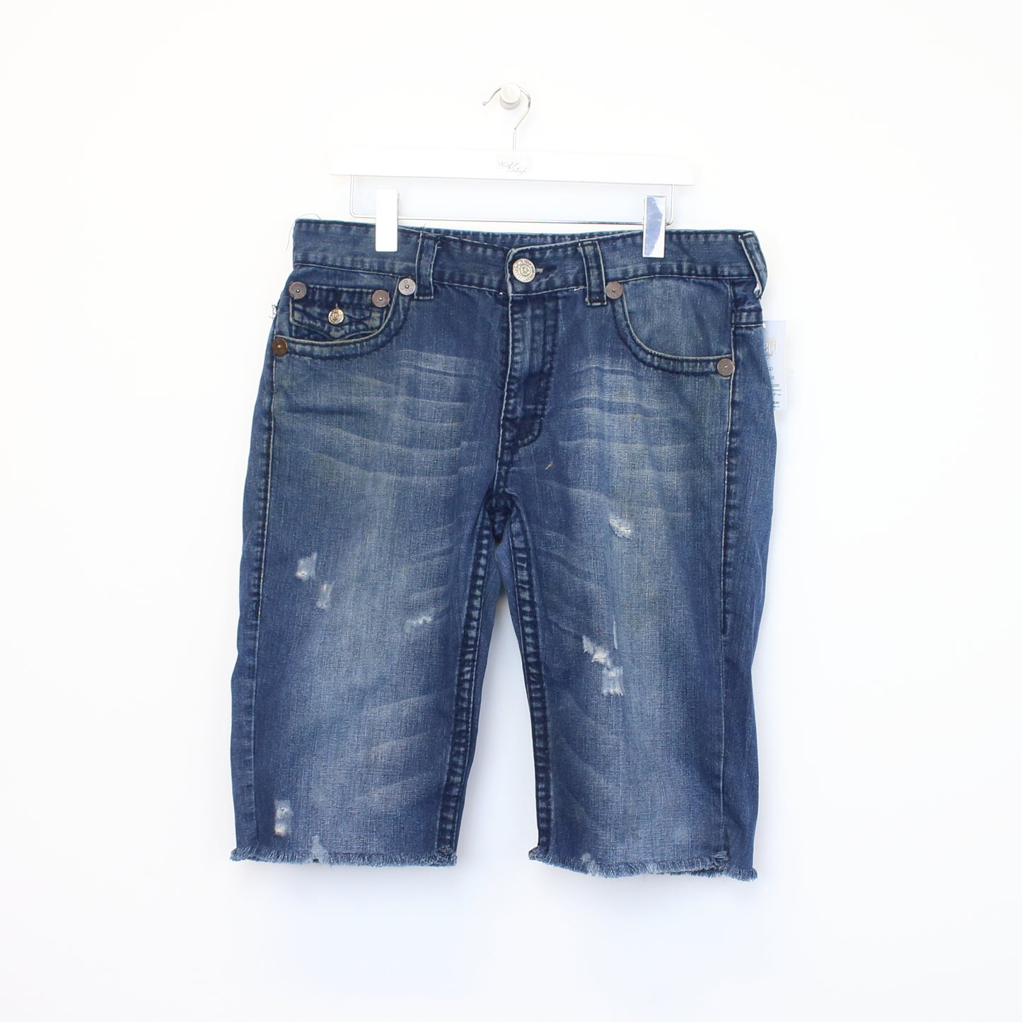 Vintage True Religion cut off shorts in blue. Best fits 34