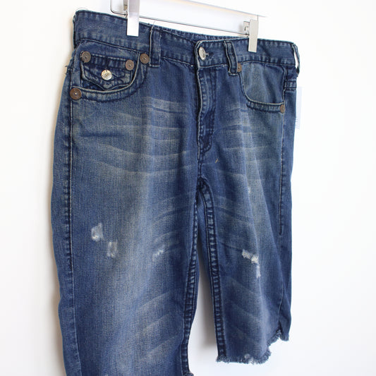 Vintage True Religion cut off shorts in blue. Best fits 34