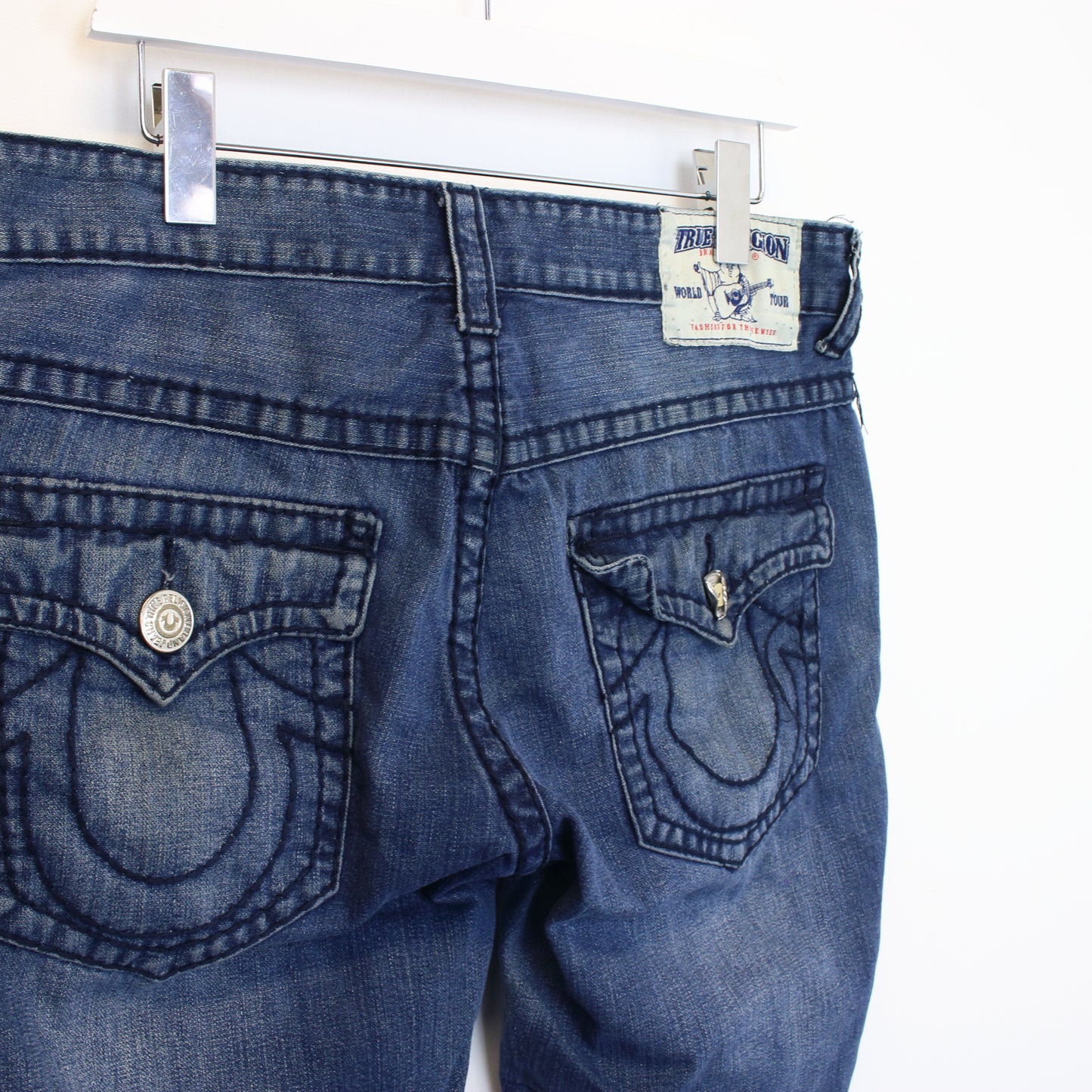 Vintage True Religion cut off shorts in blue. Best fits 34