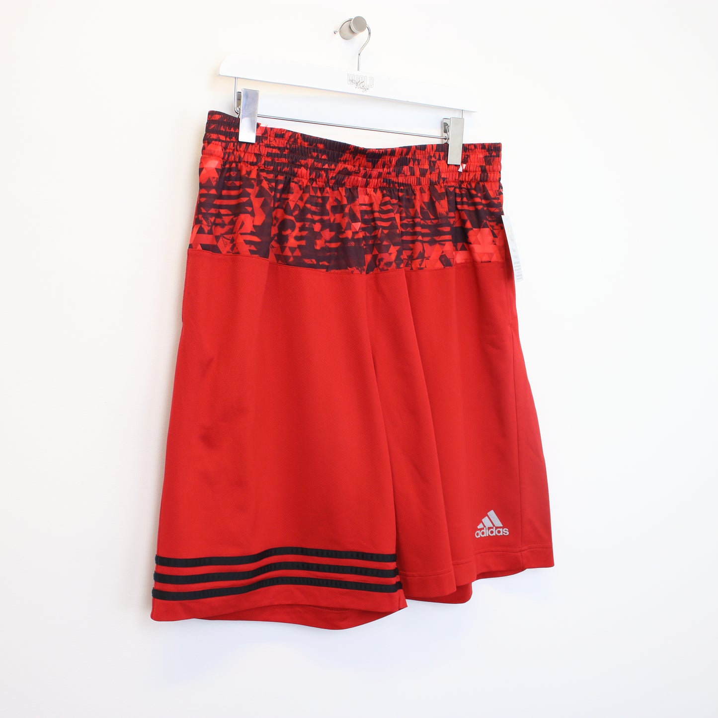 Vintage Adidas shorts in red and black. Best fits XL