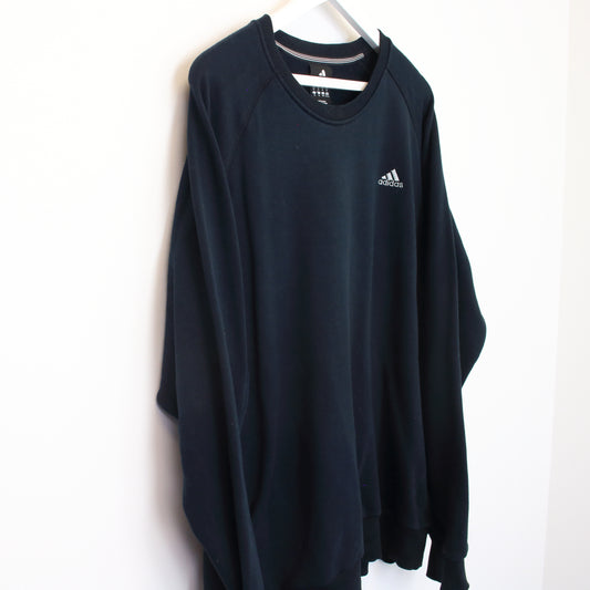 Vintage Adidas sweatshirt in black. Best fits XL