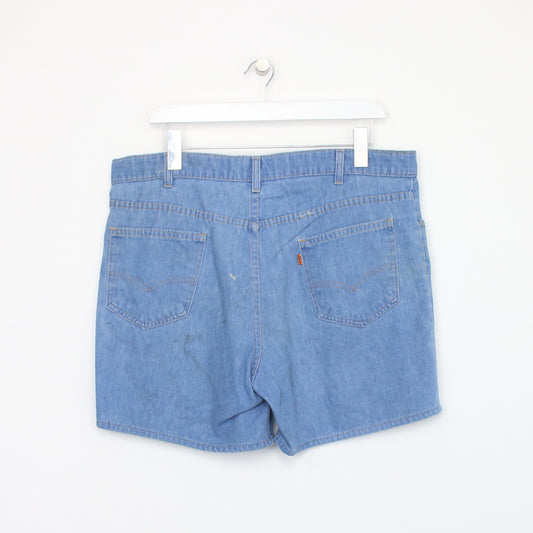 Vintage Levi's shorts in blue. Best fits W34"