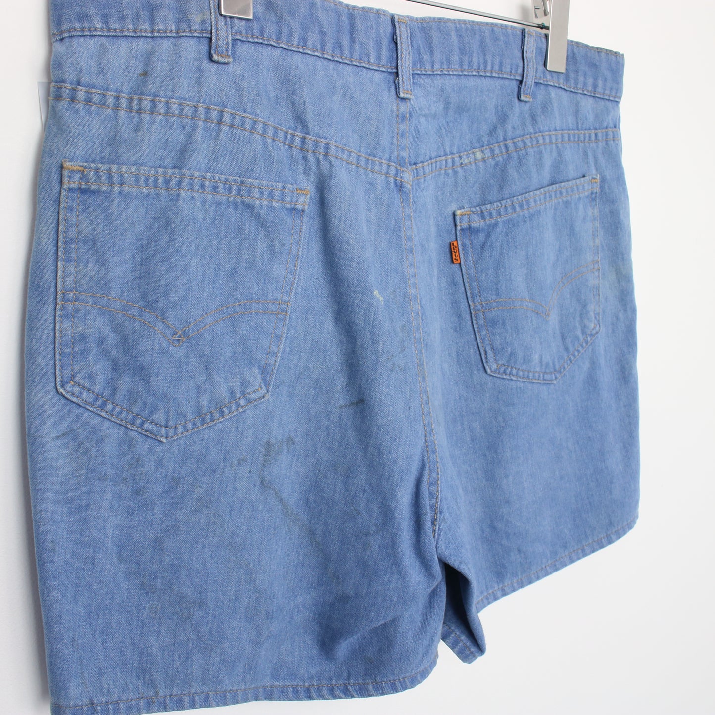 Vintage Levi's shorts in blue. Best fits W34"