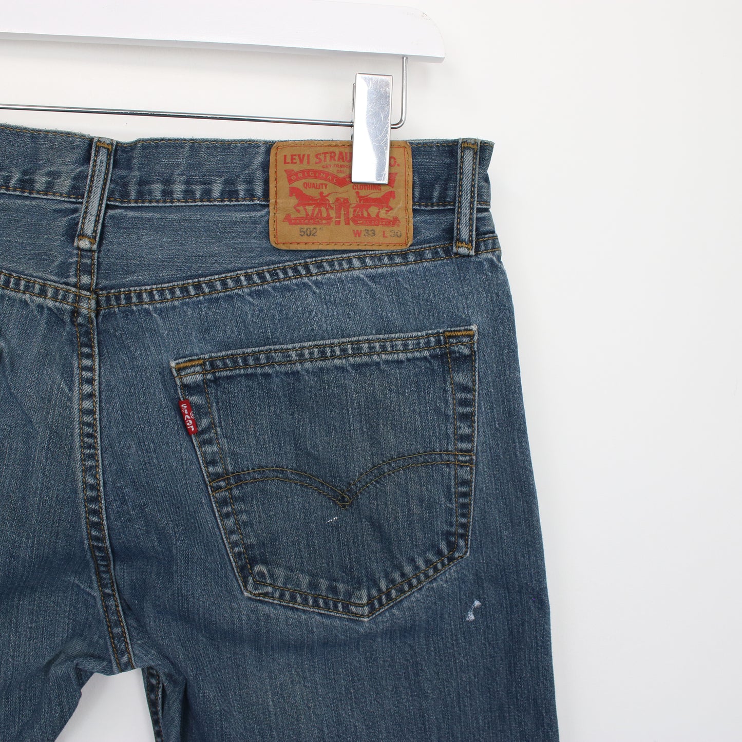 Vintage Levi's denim cut off shorts in blue. Best fits W32"