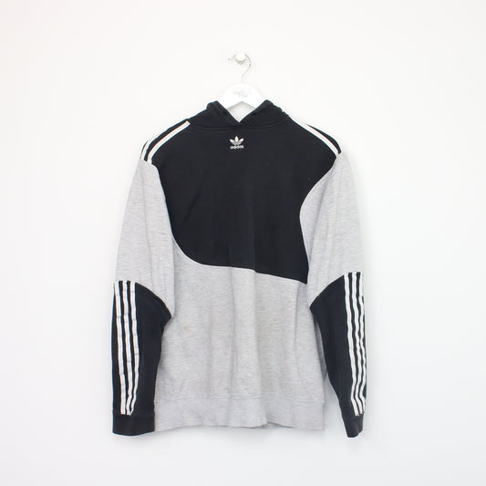 Vintage Adidas hoodie in grey and black. Best fits L