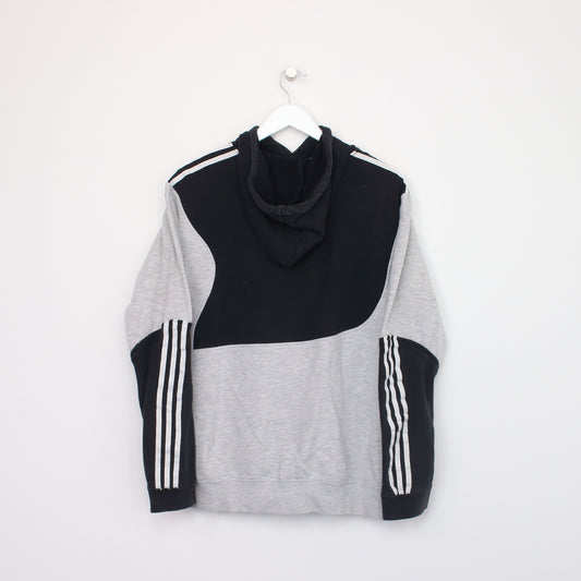 Vintage Adidas hoodie in grey and black. Best fits L