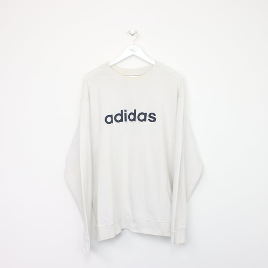 Vintage Adidas spell out sweatshirt in white. Best fits L