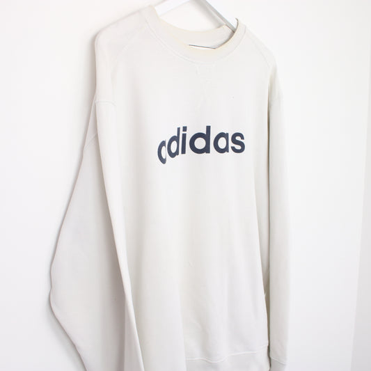 Vintage Adidas spell out sweatshirt in white. Best fits L