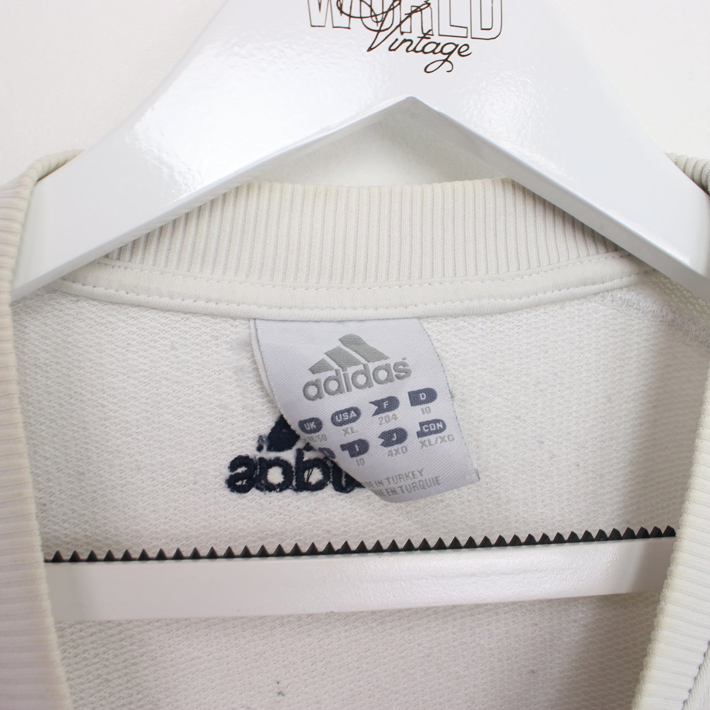 Vintage Adidas spell out sweatshirt in white. Best fits L