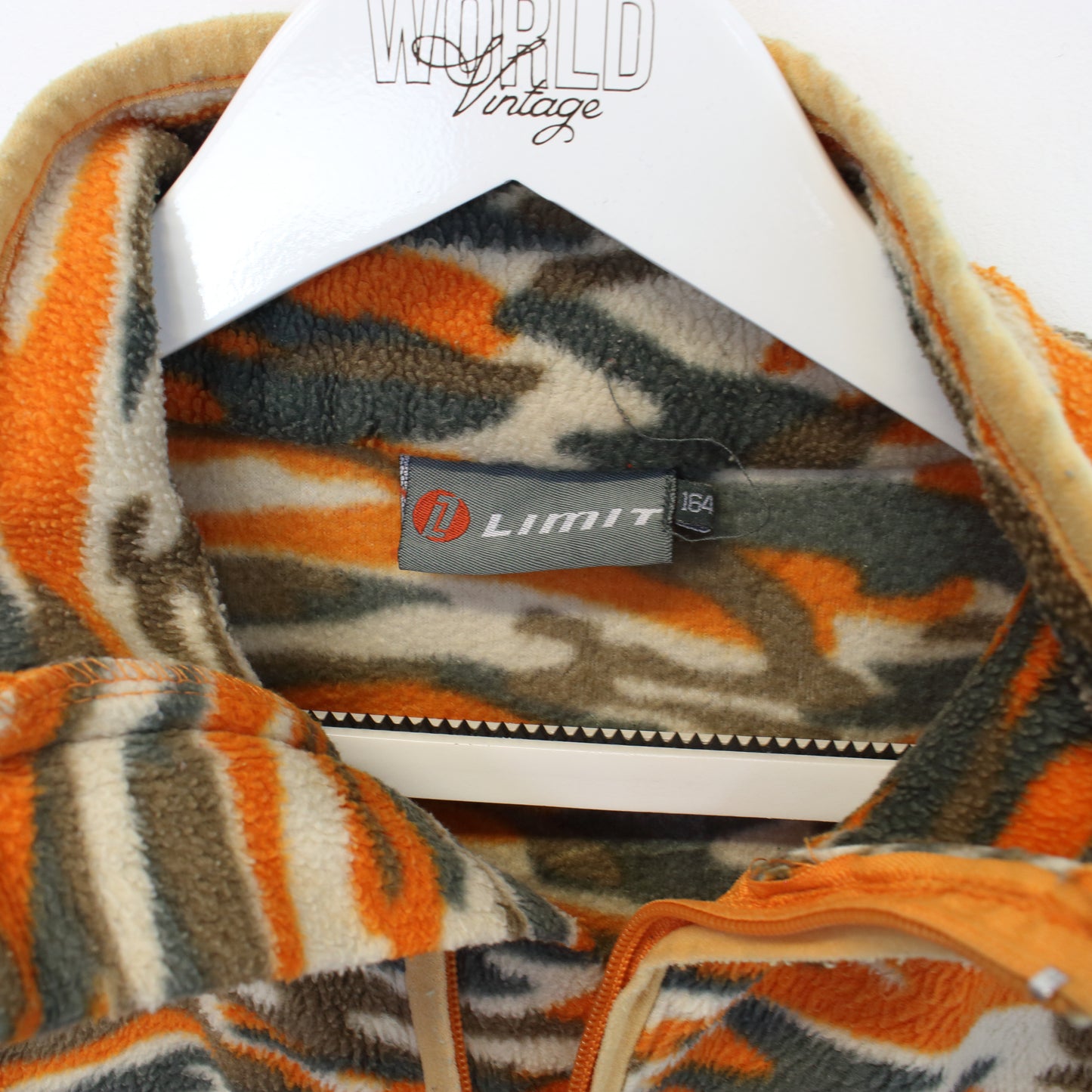 Vintage Limit cargo print fleece in orange and grey. Best fits S