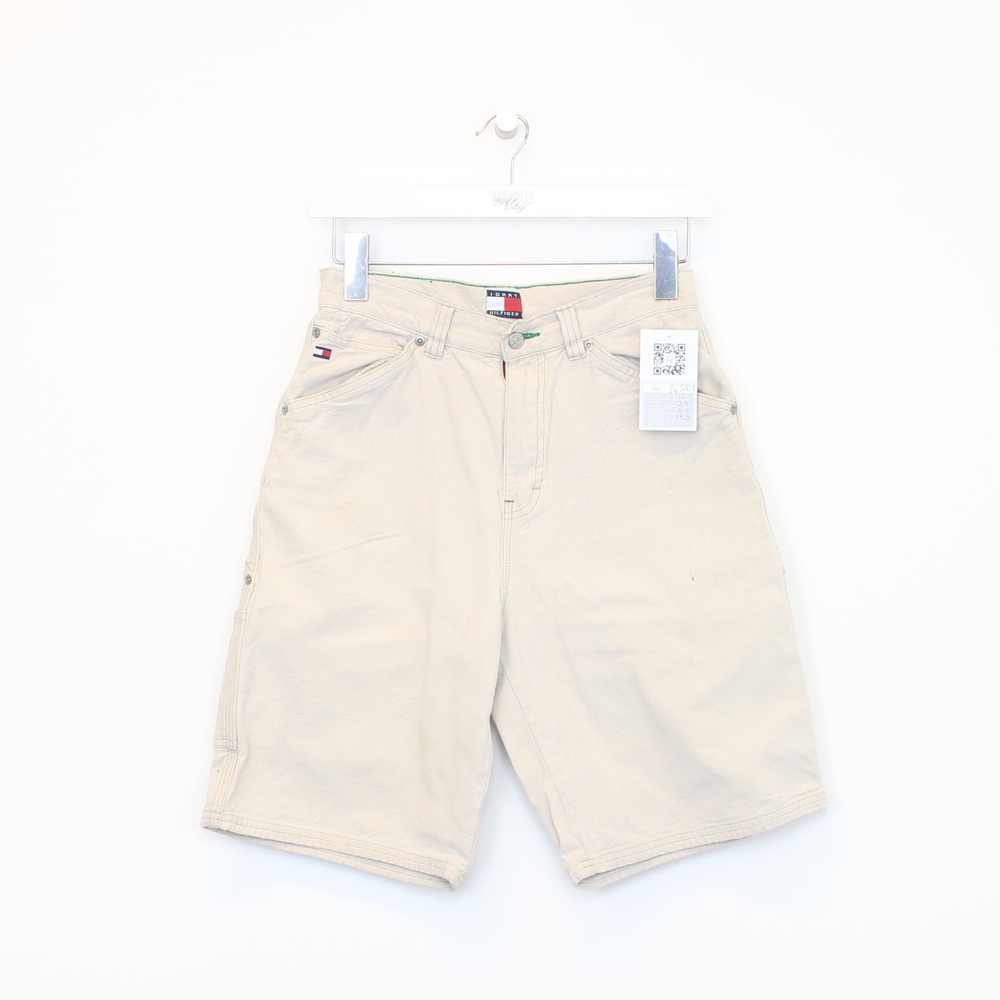 Vintage Tommy Hilfiger carpenter shorts in beige. Best fits W25"