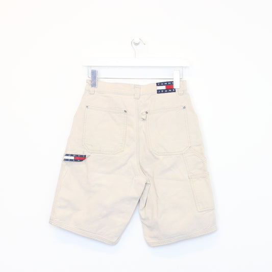 Vintage Tommy Hilfiger carpenter shorts in beige. Best fits W25"