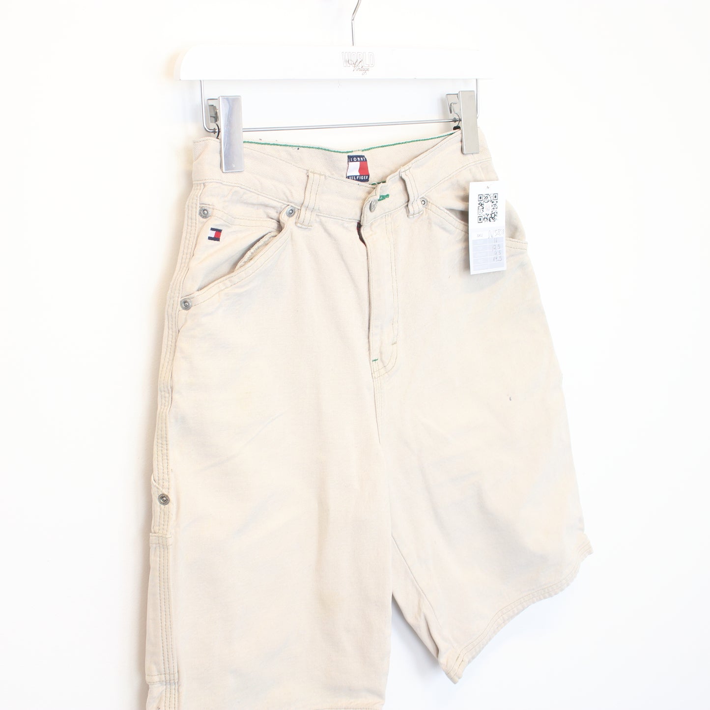 Vintage Tommy Hilfiger carpenter shorts in beige. Best fits W25"