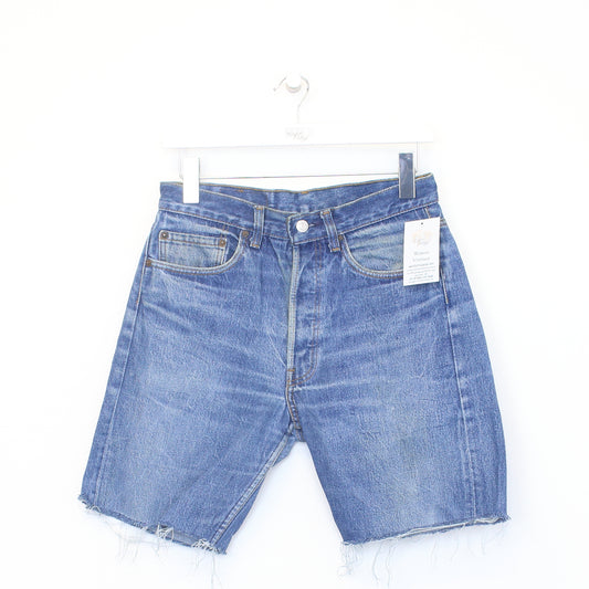 Vintage Levi's denim cut off shorts in blue. Best fits W28"