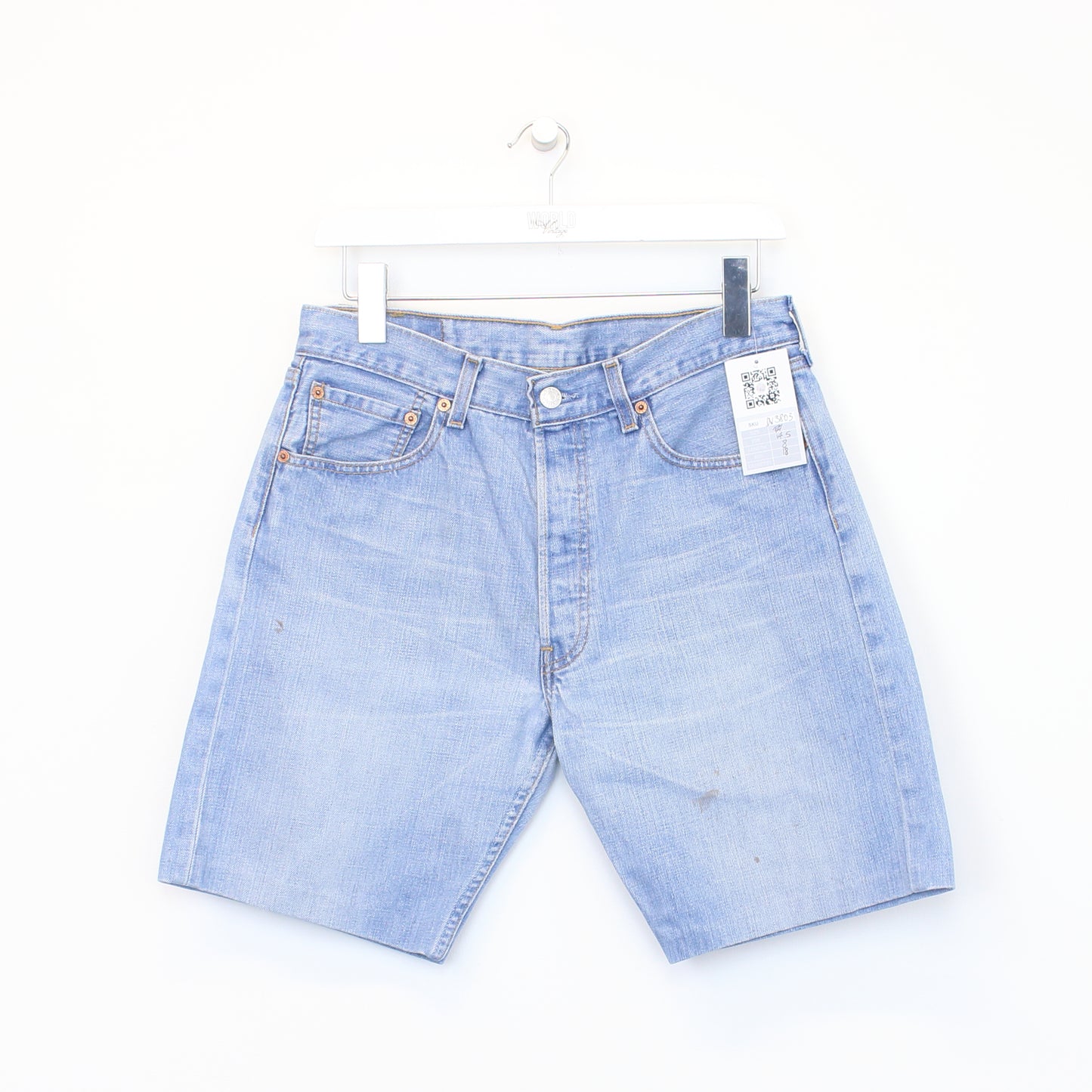 Vintage Levi's denim cut off shorts in blue. Best fits W29"