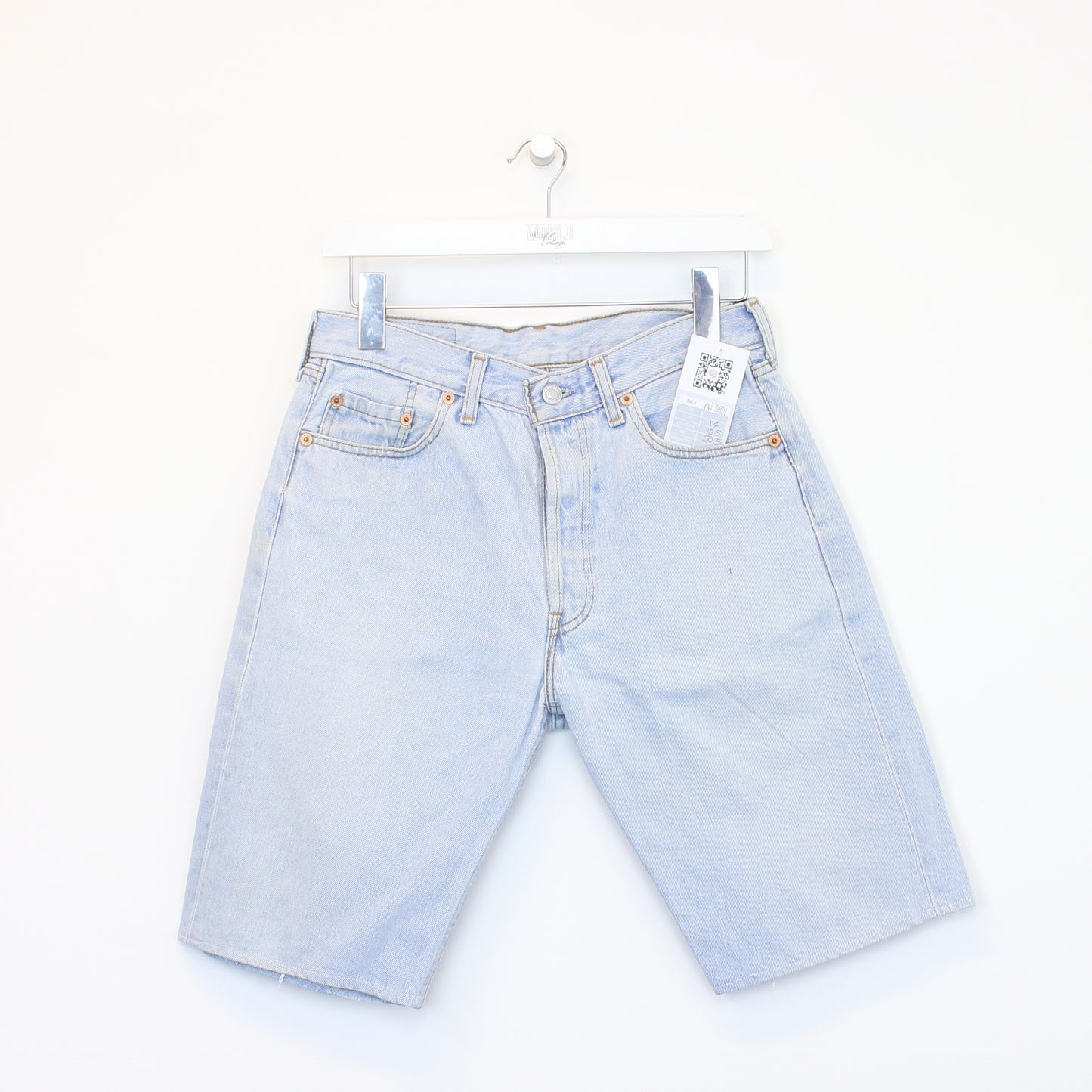 Vintage Levi's denim cut off shorts in blue. Best fits W28"