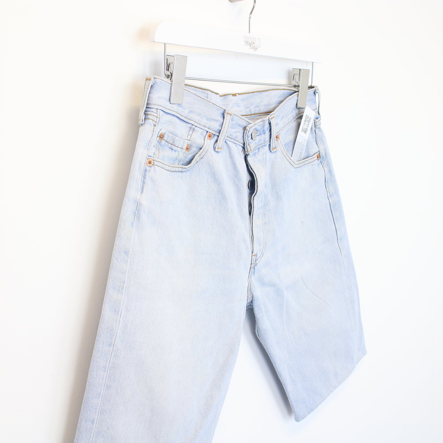 Vintage Levi's denim cut off shorts in blue. Best fits W28"