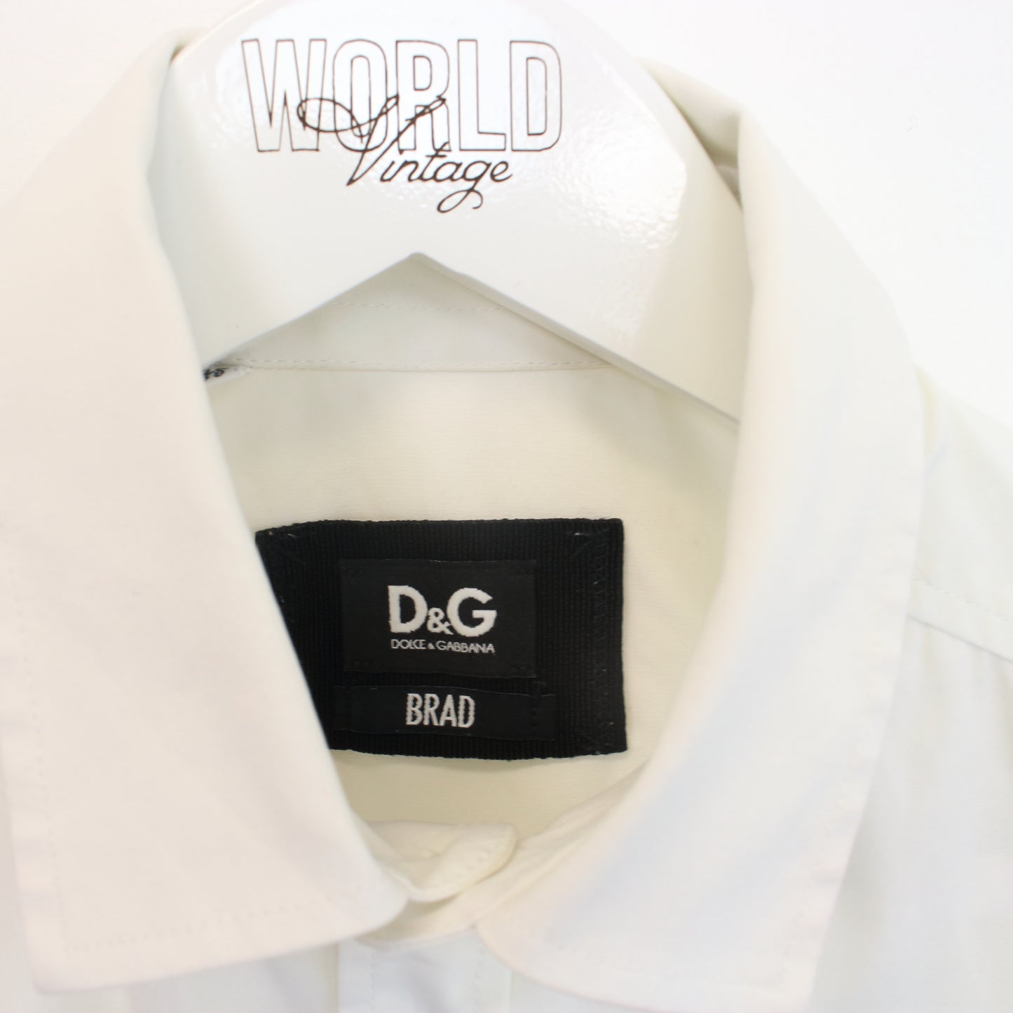 Vintage Women's Dolce & Gabbana shirt in white. Best fits M