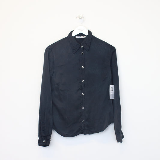 Vintage Moschino Women's shirt in black. Best fits 10