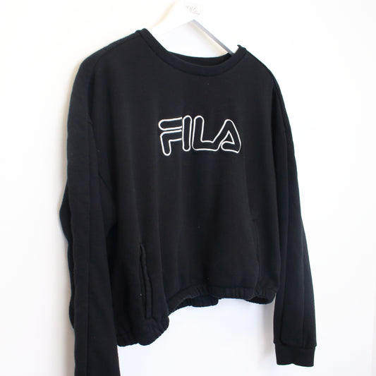 Vintage Fila sweatshirt in black. Best fits XS