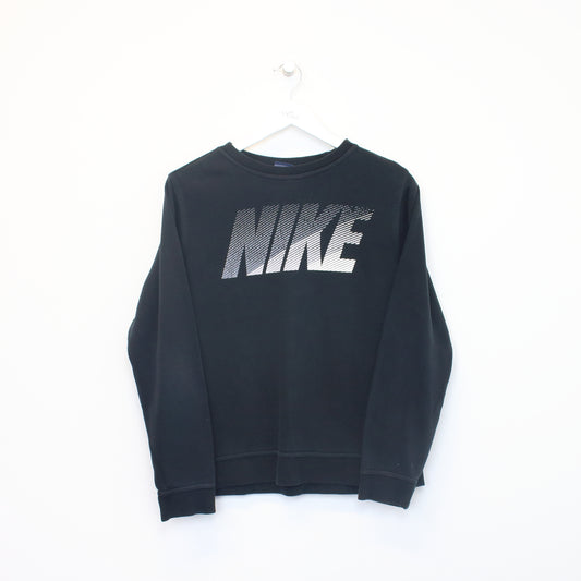 Vintage Nike spellout sweatshirt in black. Best fits XS