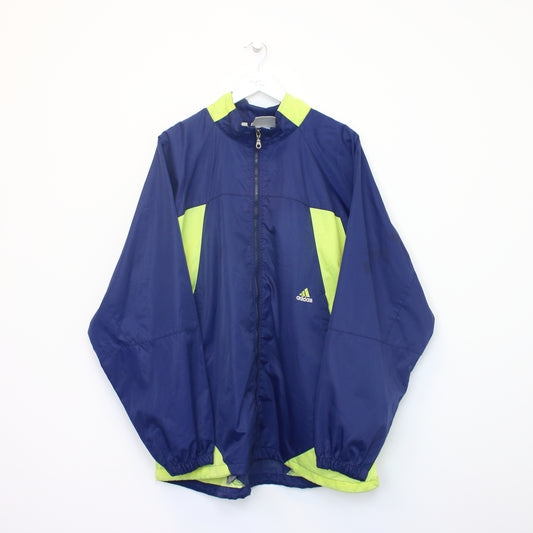 Vintage Adidas track jacket in blue and green. Best fits XL