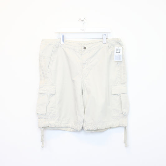 Vintage Adidas cargo shorts in beige. Best fits 40