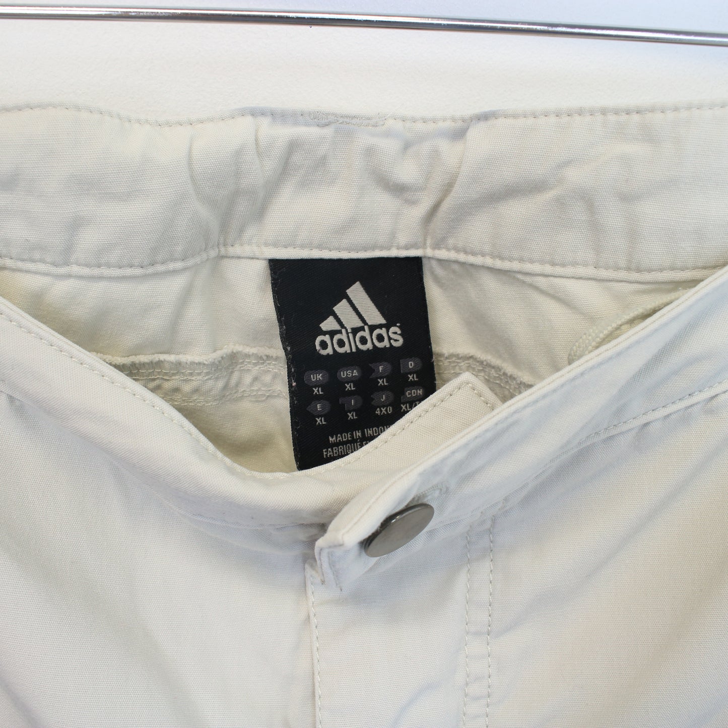Vintage Adidas cargo shorts in beige. Best fits 40