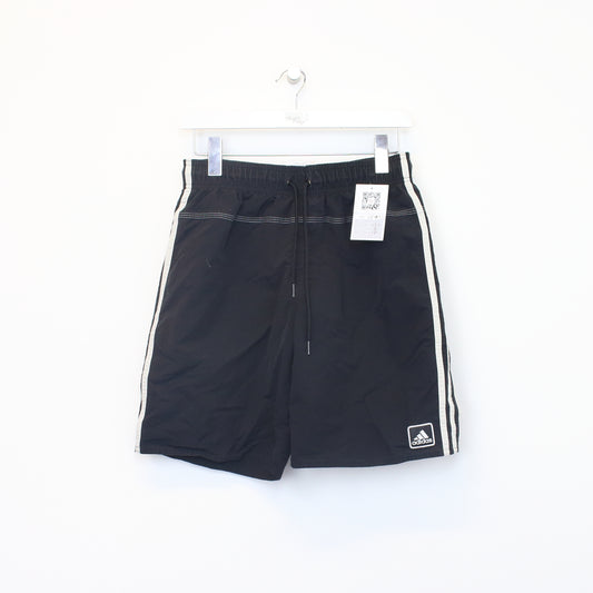 Vintage Adidas shorts in black and white . Best fits S