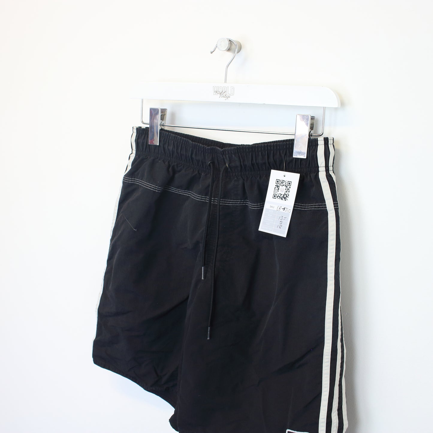 Vintage Adidas shorts in black and white . Best fits S