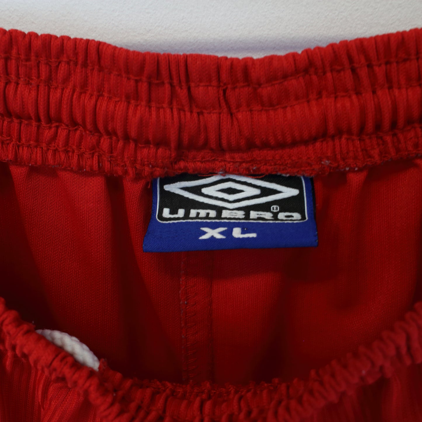 Vintage Umbro shorts in red. Best fits L