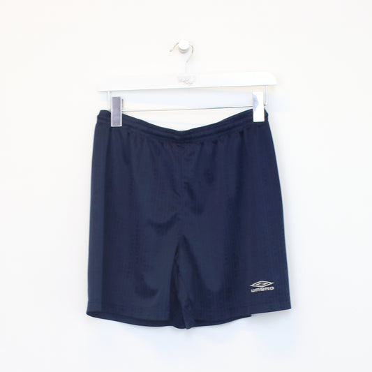 Vintage Umbro shorts in navy. Best fits S