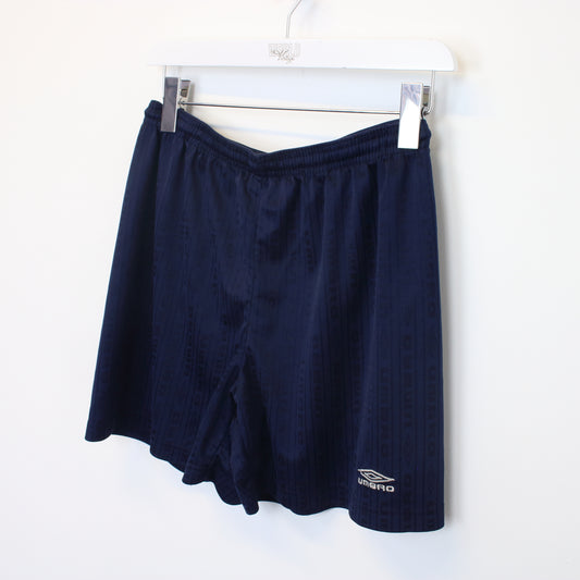 Vintage Umbro shorts in navy. Best fits S